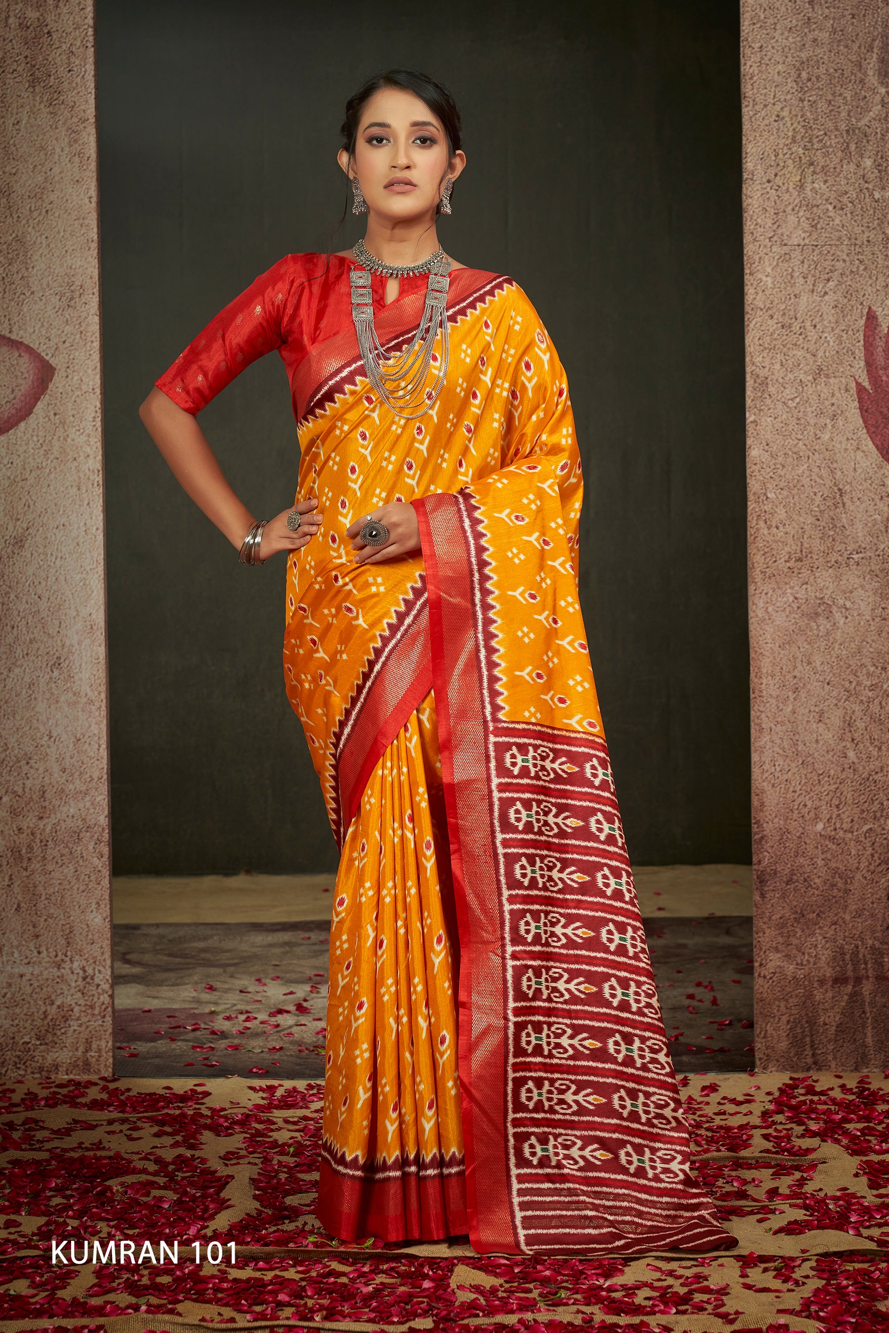 KUMRAN Golden Mustard Patola Elegance Saree