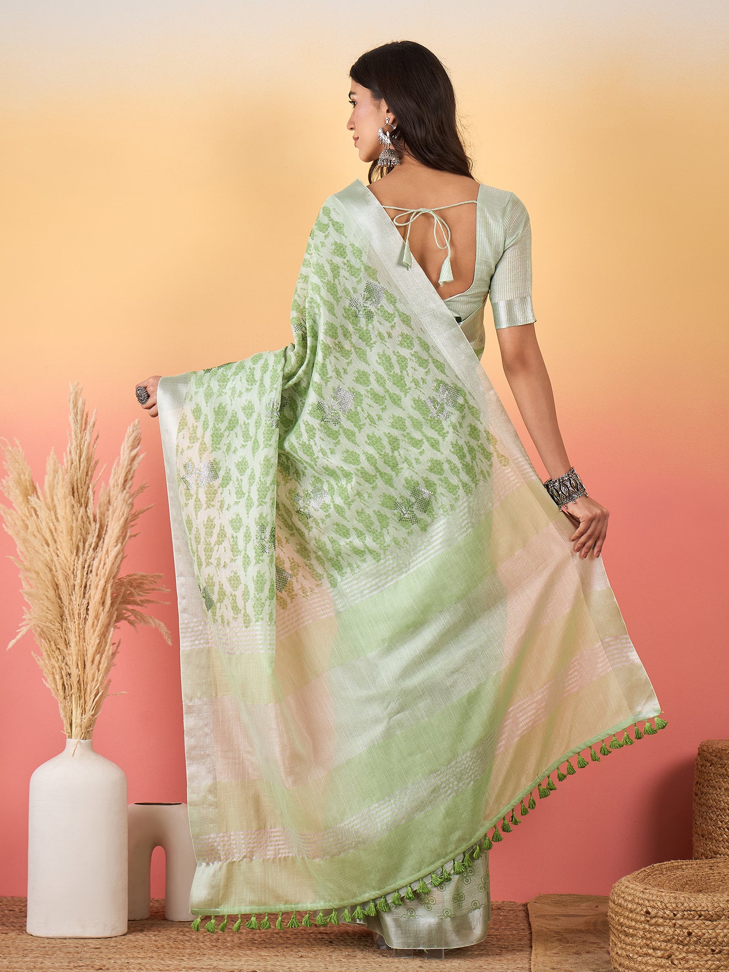 ZARI MAHAL-Mint Green Floral Printed Linen Saree with Elegant Tassel Pallu