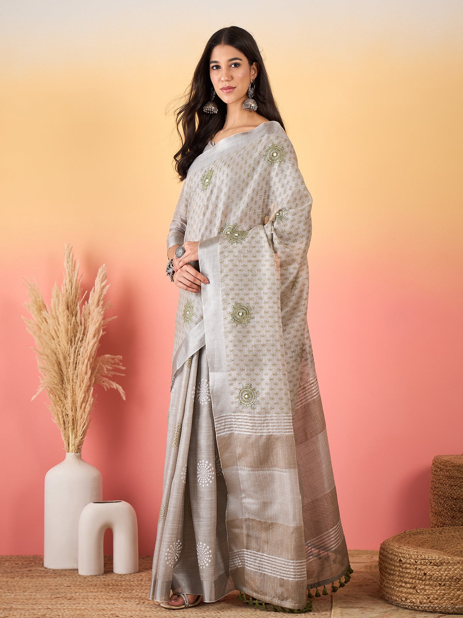 ZARI MAHAL-Graceful zari-style border adds a refined traditional touch