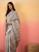 ZARI MAHAL-Graceful zari-style border adds a refined traditional touch