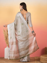 ZARI MAHAL-Graceful zari-style border adds a refined traditional touch