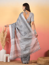 ZARI MAHAL-Elegant Silver Grey Linen Saree with Intricate Black Floral Woven Border