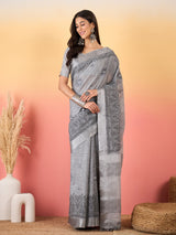 ZARI MAHAL-Elegant Silver Grey Linen Saree with Intricate Black Floral Woven Border