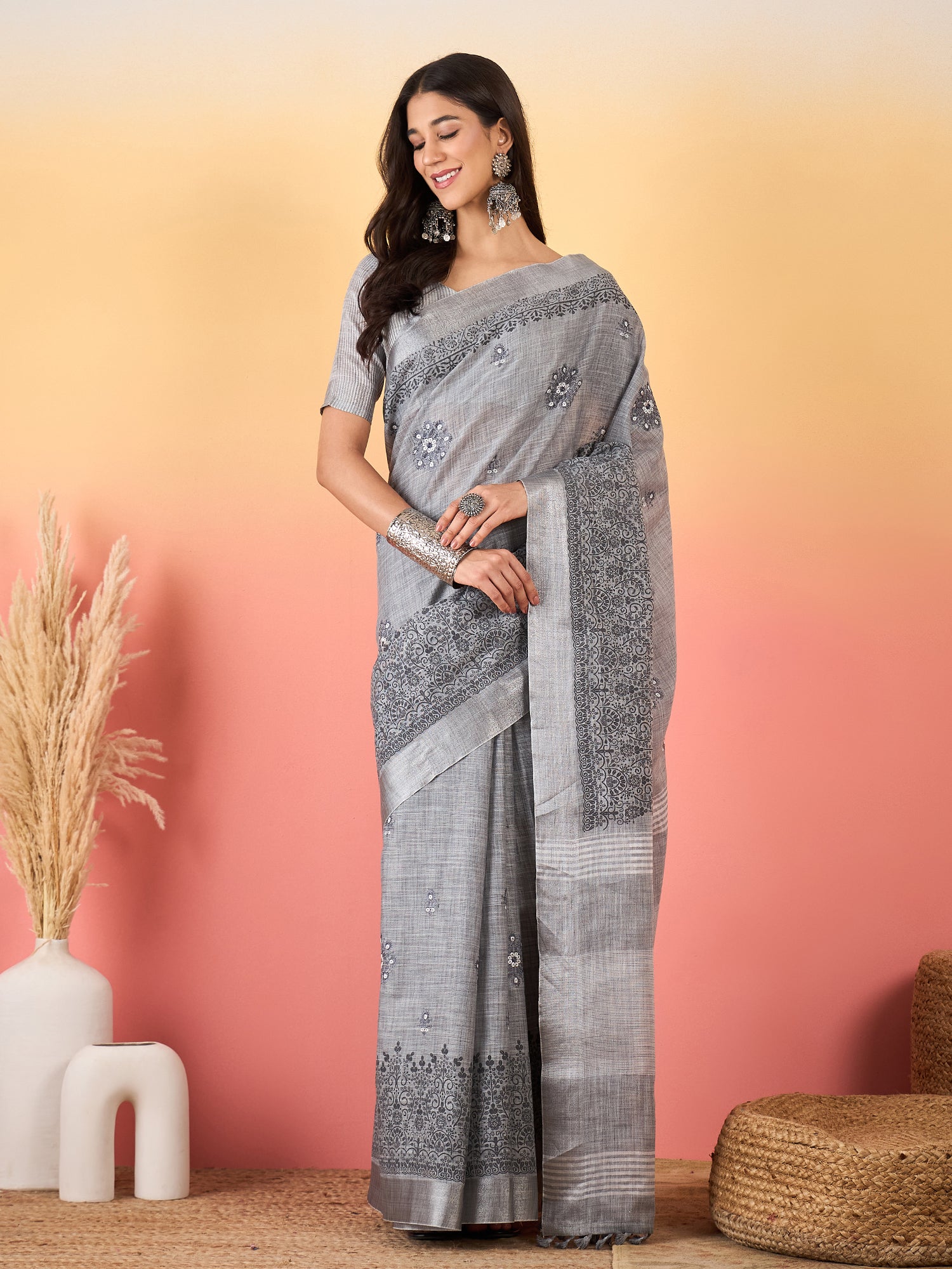 ZARI MAHAL-Elegant Silver Grey Linen Saree with Intricate Black Floral Woven Border