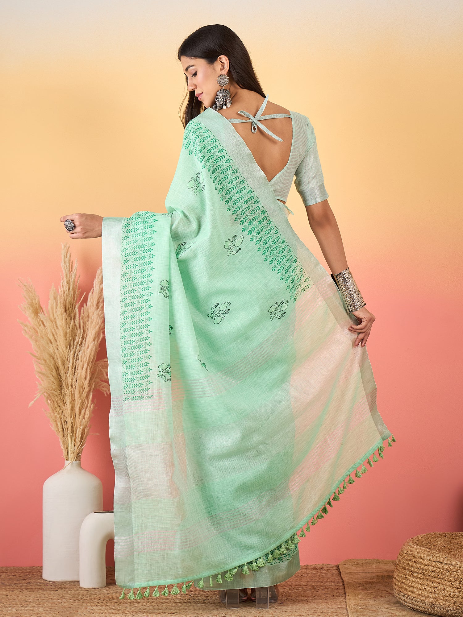 ZARI MAHAL-Mint Green Linen Saree with Elegant Floral Woven Border & Subtle Motif Work