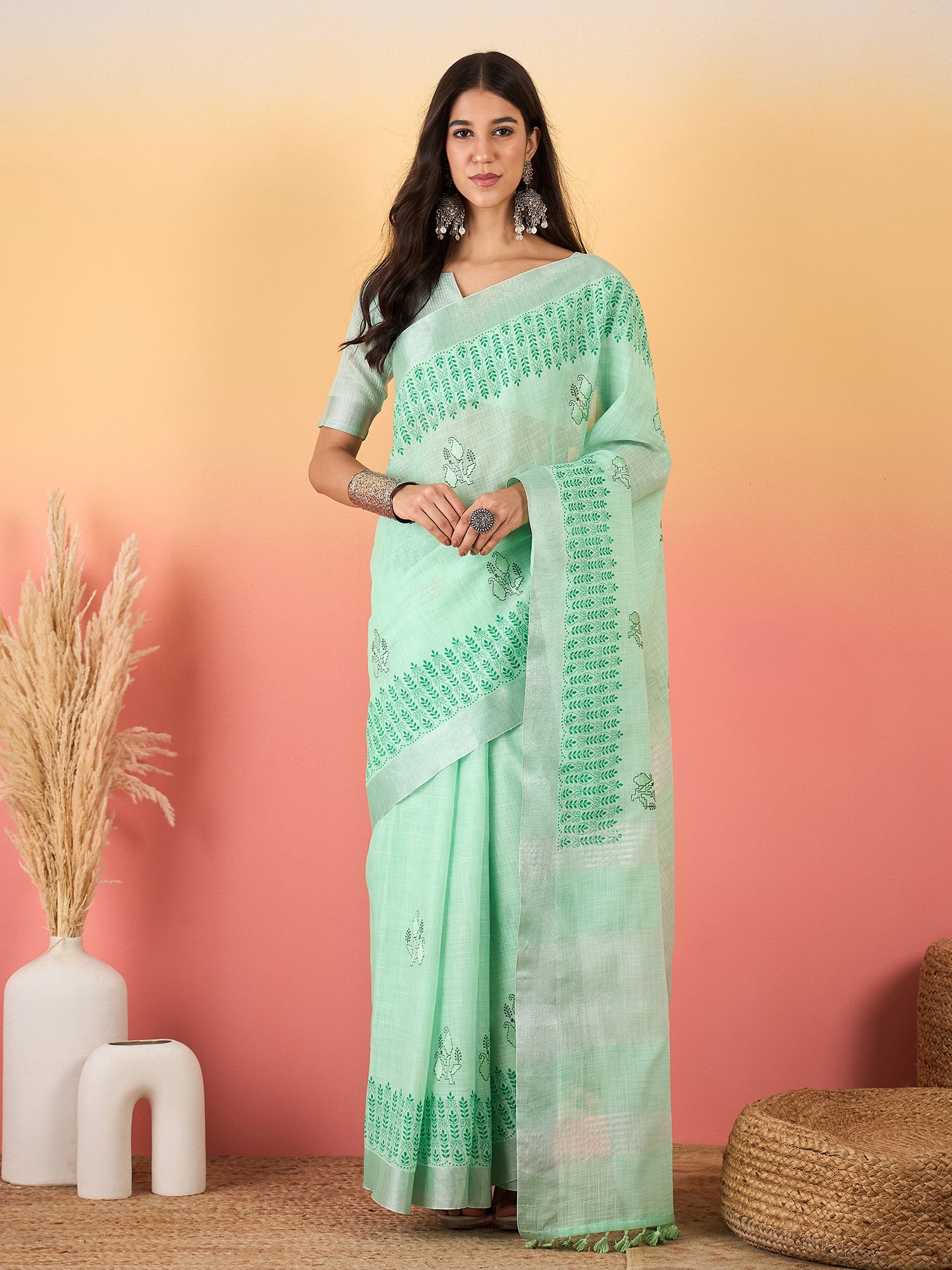 ZARI MAHAL-Mint Green Linen Saree with Elegant Floral Woven Border & Subtle Motif Work