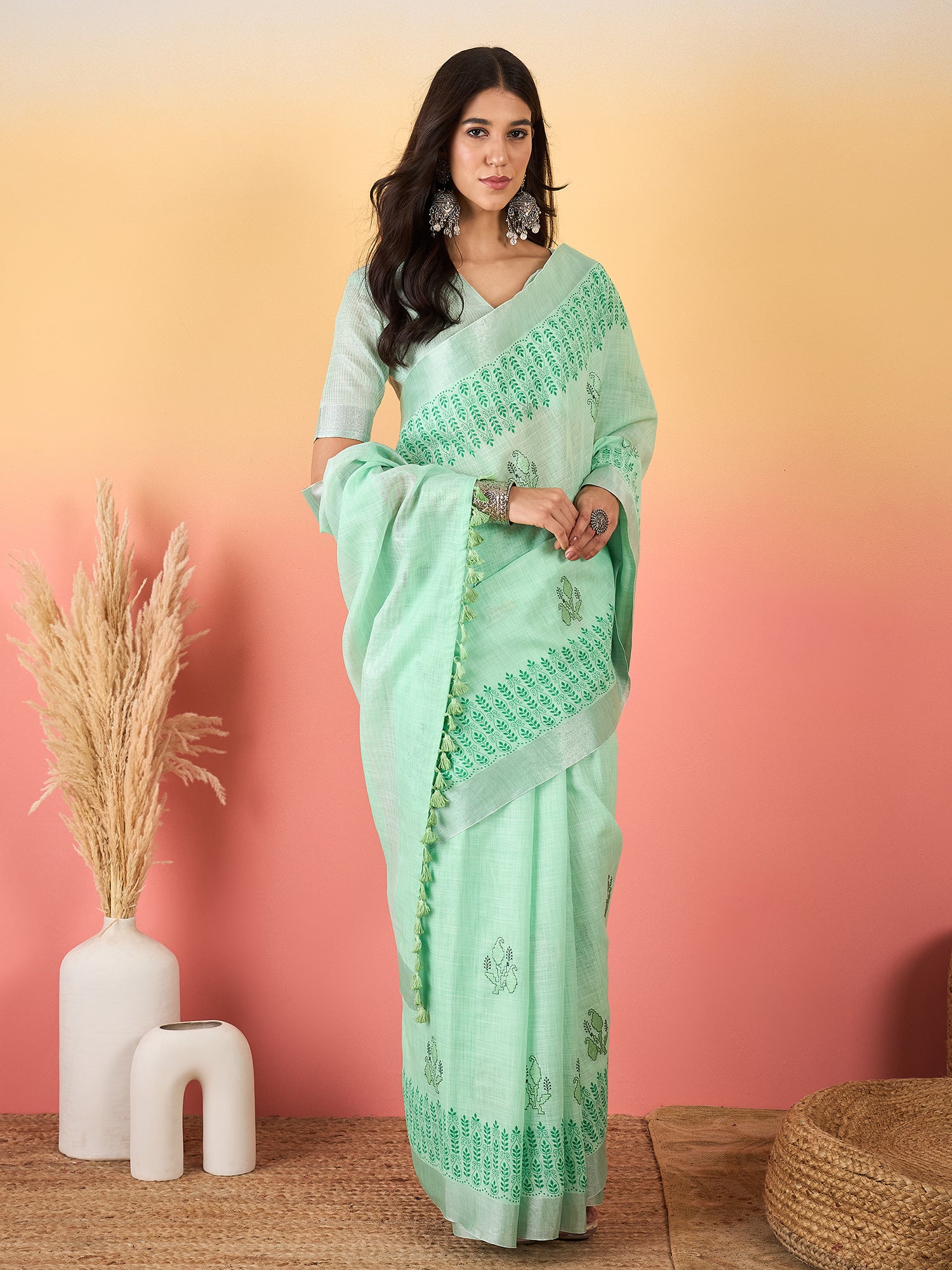 ZARI MAHAL-Mint Green Linen Saree with Elegant Floral Woven Border & Subtle Motif Work