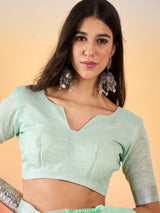 ZARI MAHAL-Mint Green Linen Saree with Elegant Floral Woven Border & Subtle Motif Work