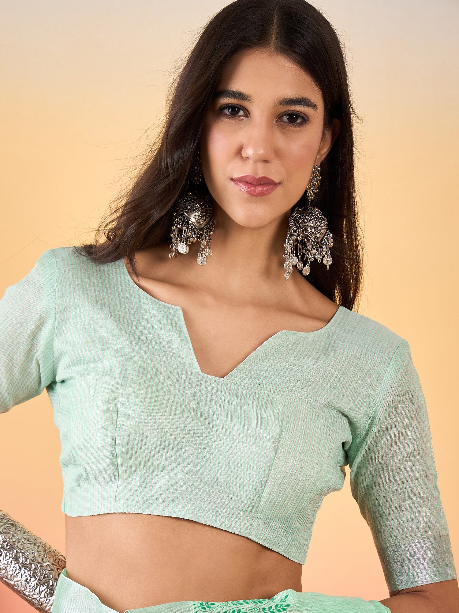 ZARI MAHAL-Mint Green Linen Saree with Elegant Floral Woven Border & Subtle Motif Work