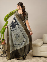 ADHIRA-Elegant black saree featuring intricate traditional mythological and folk art inspired prints