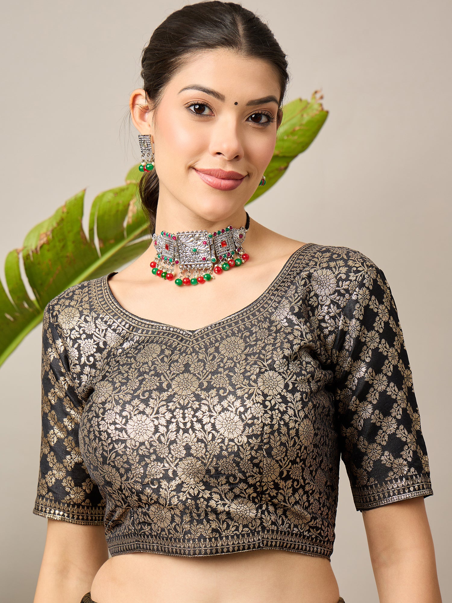 ADHIRA-Elegant black saree featuring intricate traditional mythological and folk art inspired prints