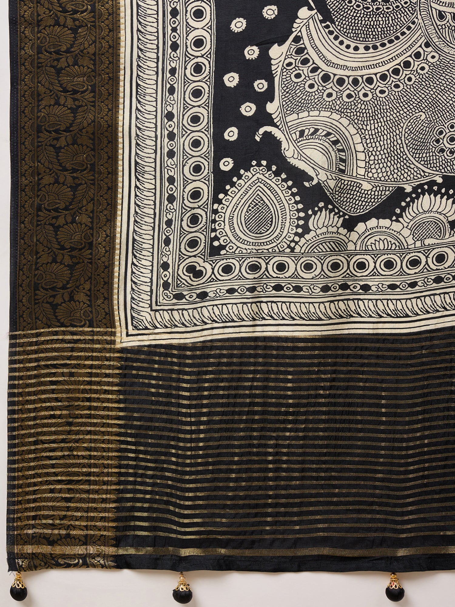 ADHIRA-Elegant black saree featuring intricate traditional mythological and folk art inspired prints