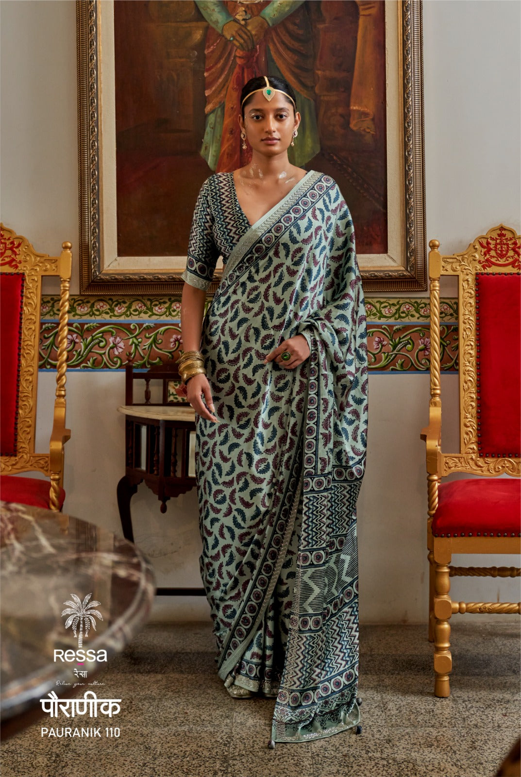 PAURANIK-Elegant pastel mint green saree with delicate paisley-inspired ethnic printsElegant pastel mint green saree with delicate paisley-inspired ethnic prints