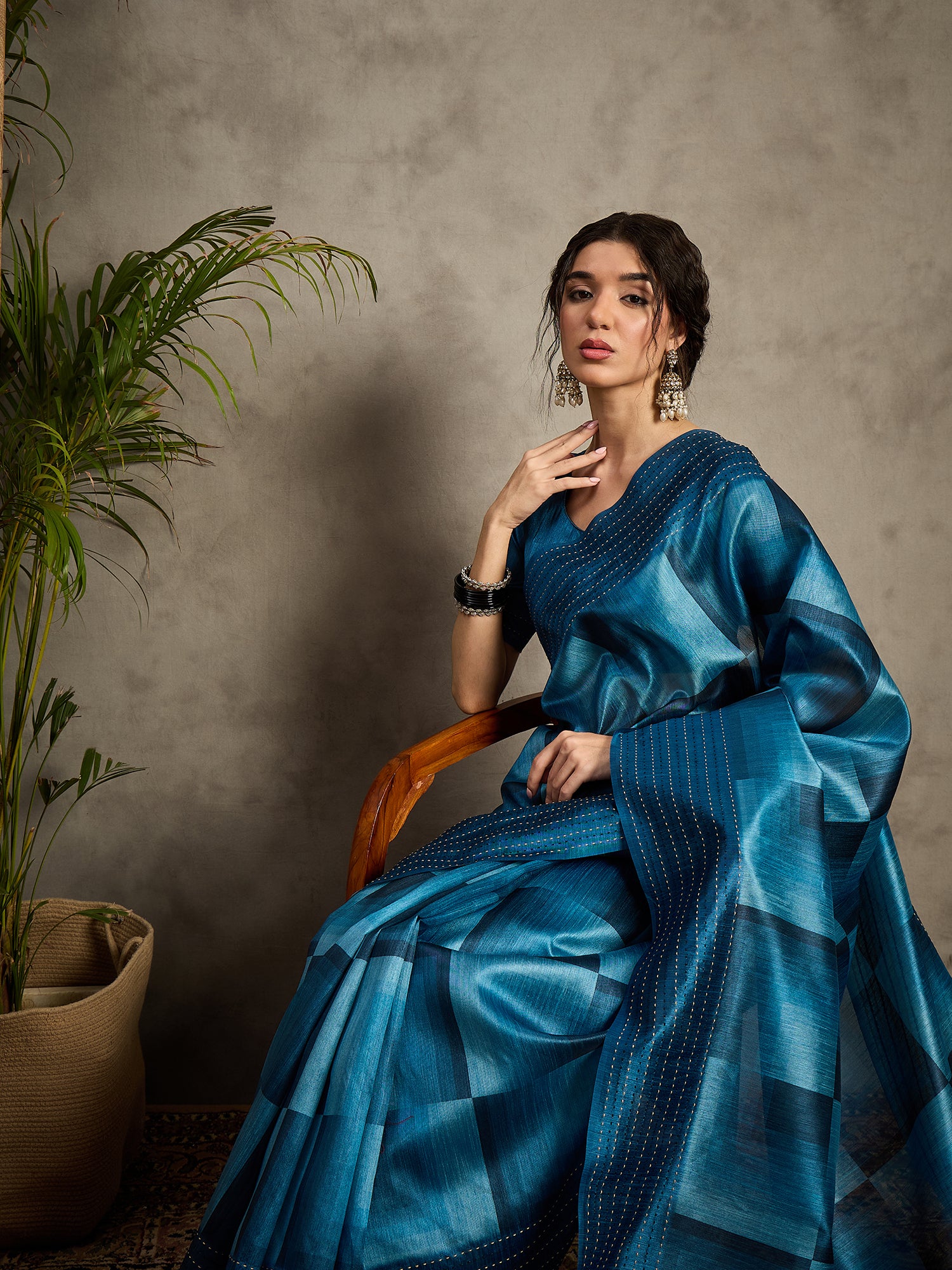TARANG-Royal Teal Blue Designer Saree with Abstract Check Patterns and Elegant Woven Border