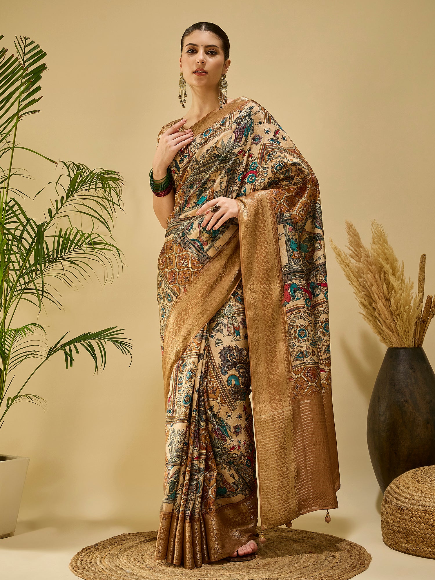 ADHIRA-Elegant Beige Heritage Printed Saree with Antique Gold Zari Border and Traditional Folk Art Motifs for Festive & Ethnic Wear