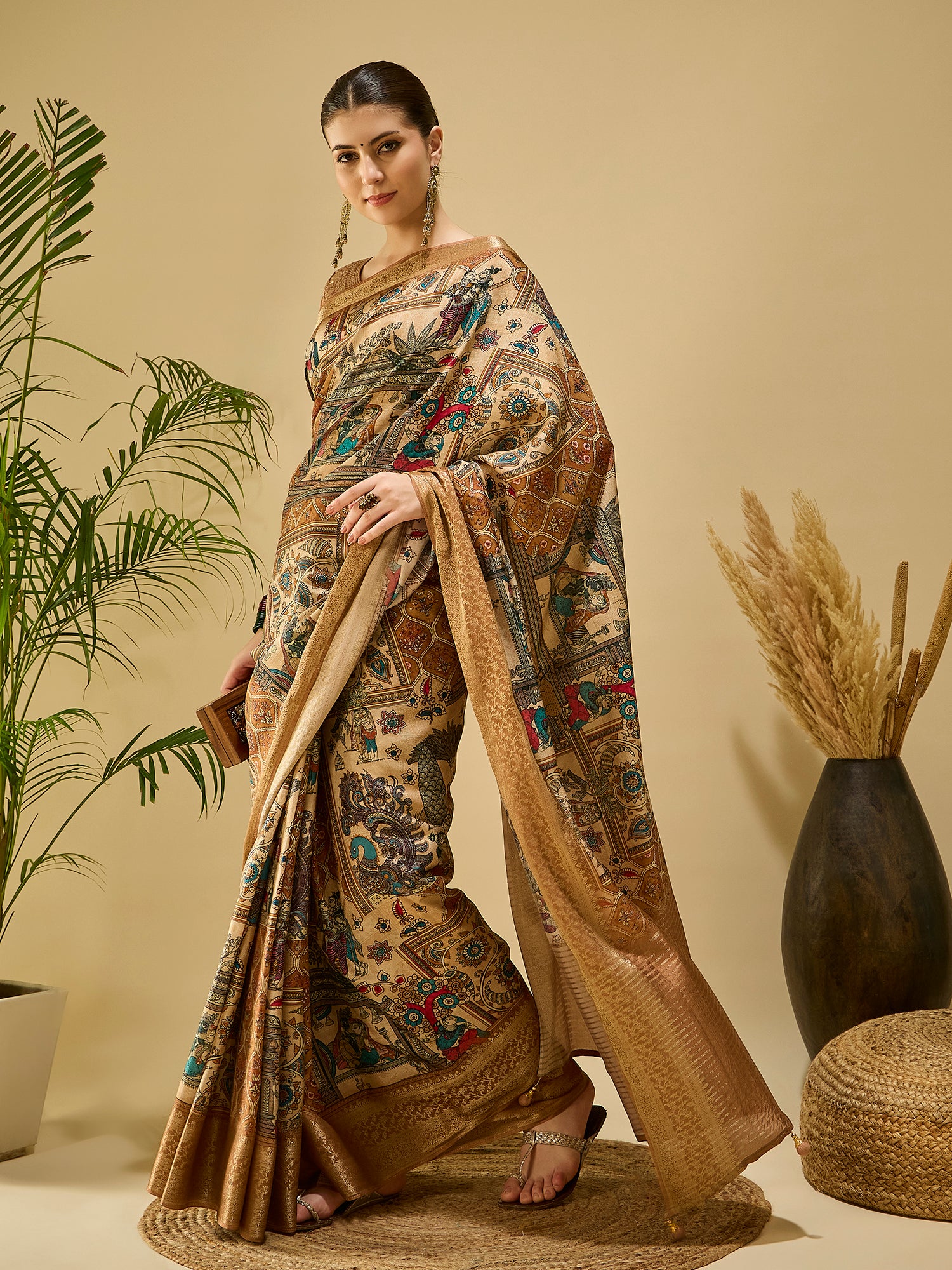 ADHIRA-Elegant Beige Heritage Printed Saree with Antique Gold Zari Border and Traditional Folk Art Motifs for Festive & Ethnic Wear