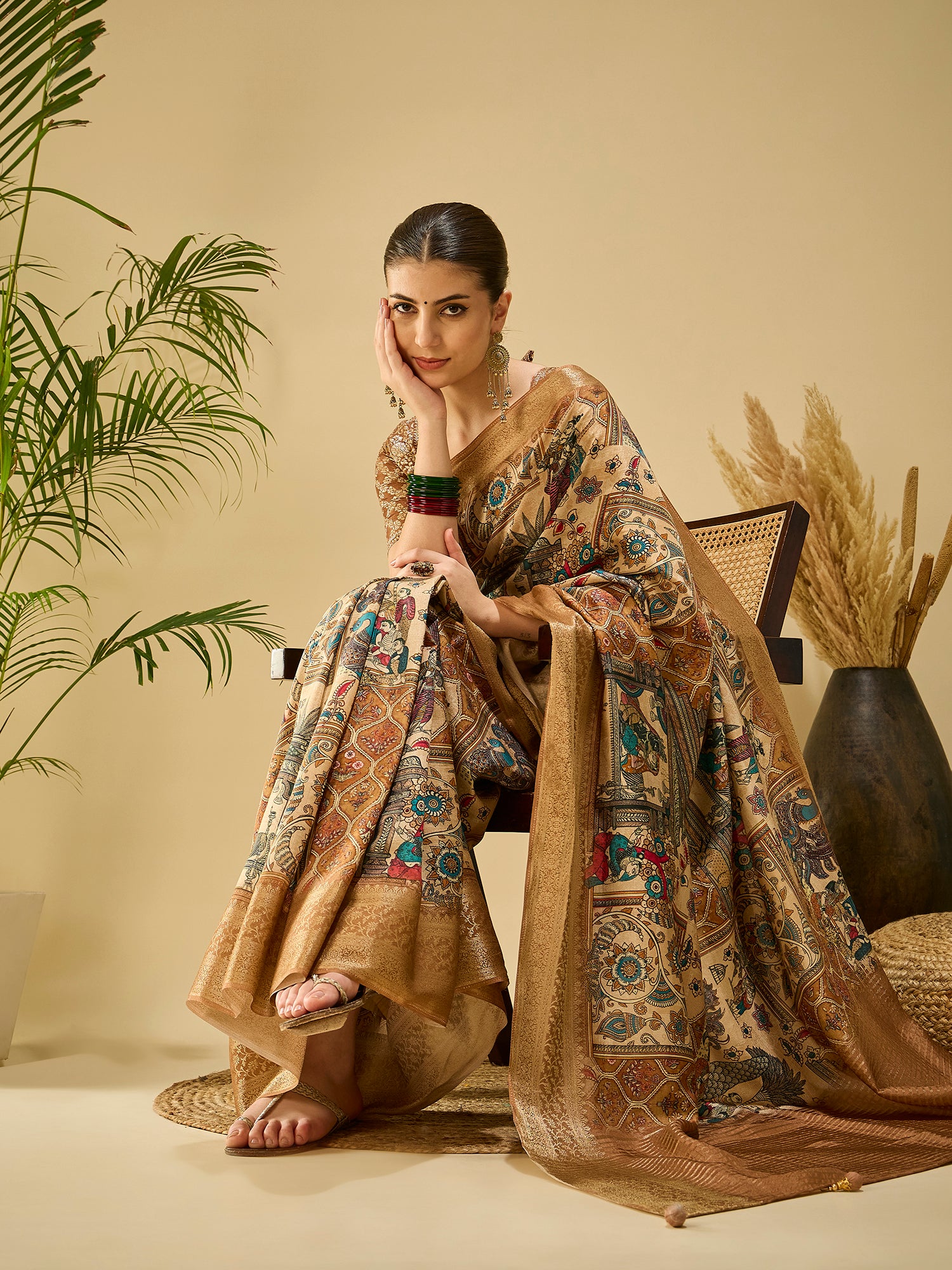ADHIRA-Elegant Beige Heritage Printed Saree with Antique Gold Zari Border and Traditional Folk Art Motifs for Festive & Ethnic Wear