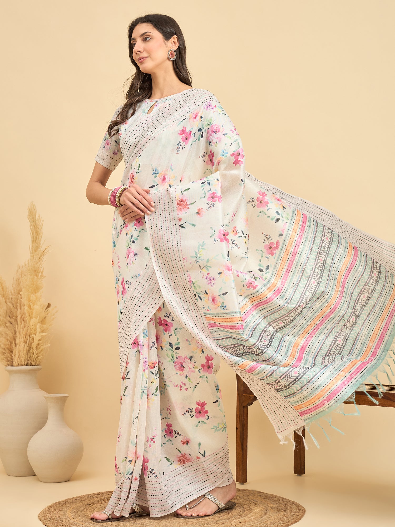 TARANG-Elegant Off-White Floral Printed Linen Saree with Multicolor Woven Border & Tassel Detailing