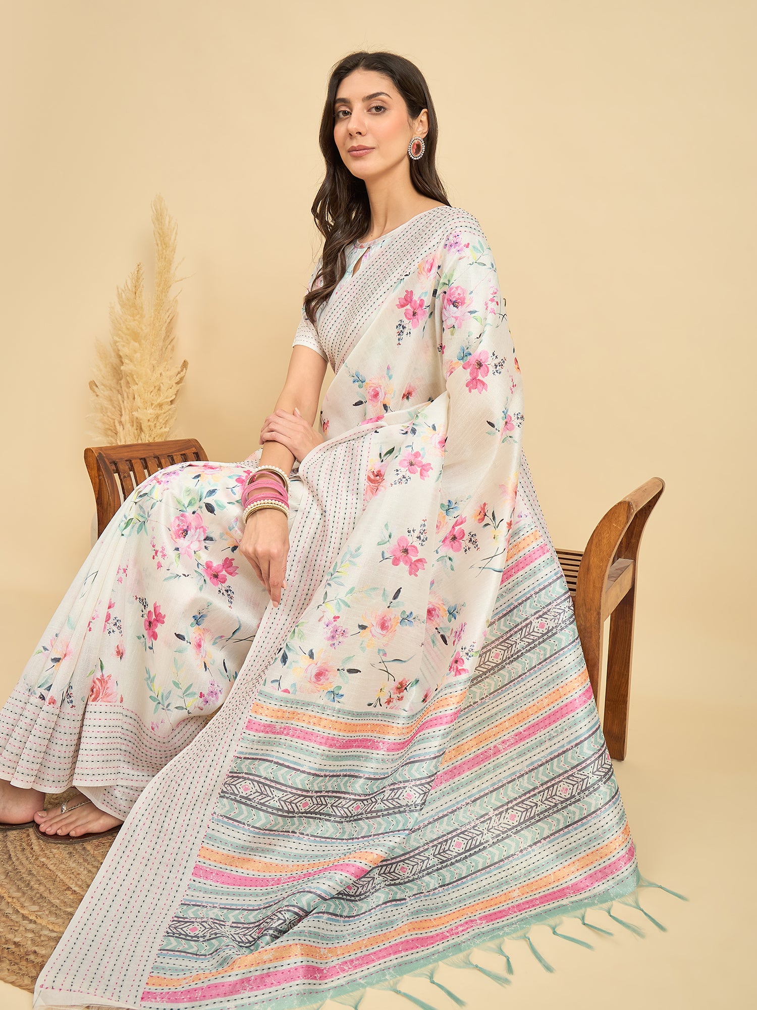 TARANG-Elegant Off-White Floral Printed Linen Saree with Multicolor Woven Border & Tassel Detailing