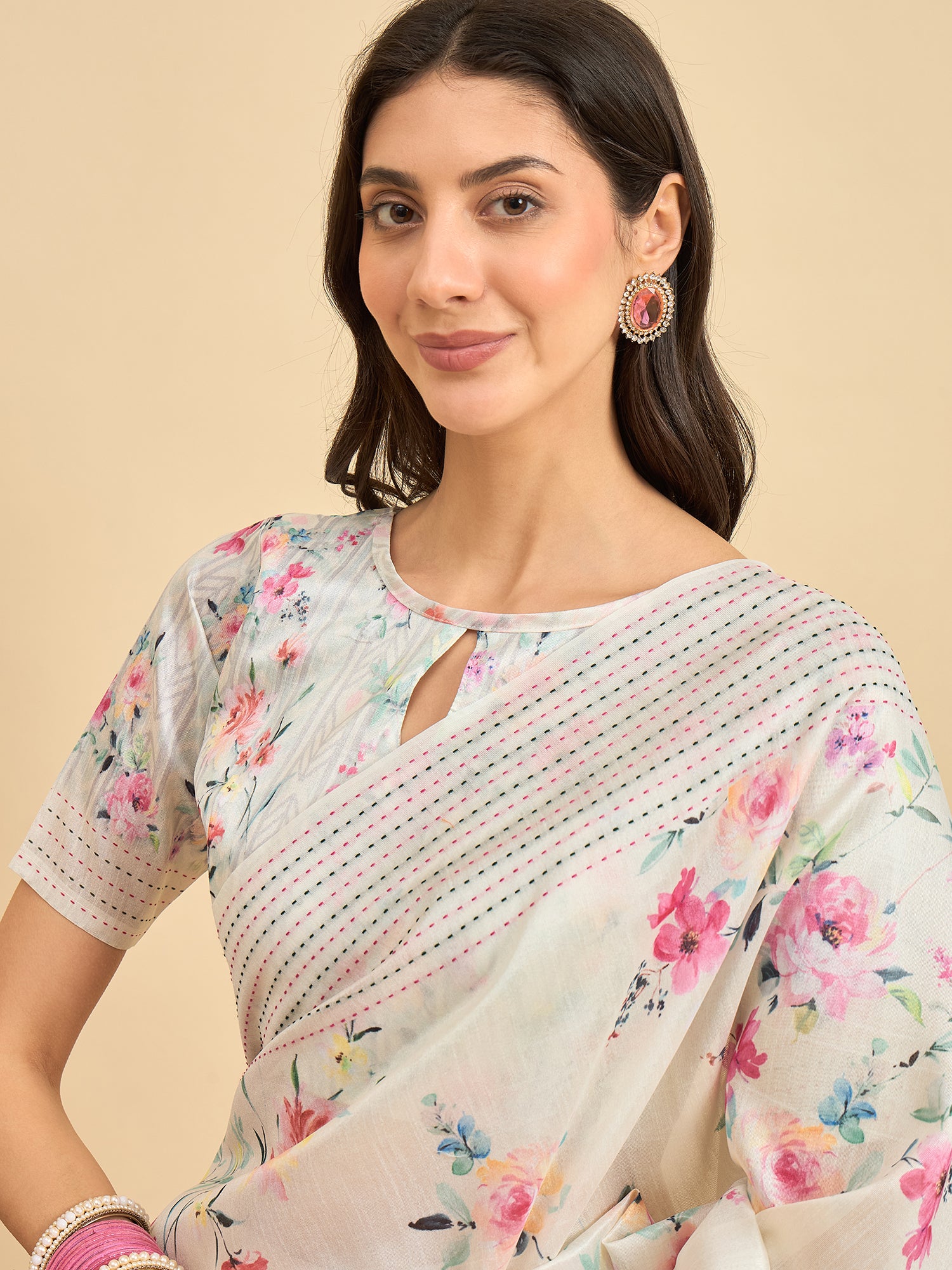 TARANG-Elegant Off-White Floral Printed Linen Saree with Multicolor Woven Border & Tassel Detailing