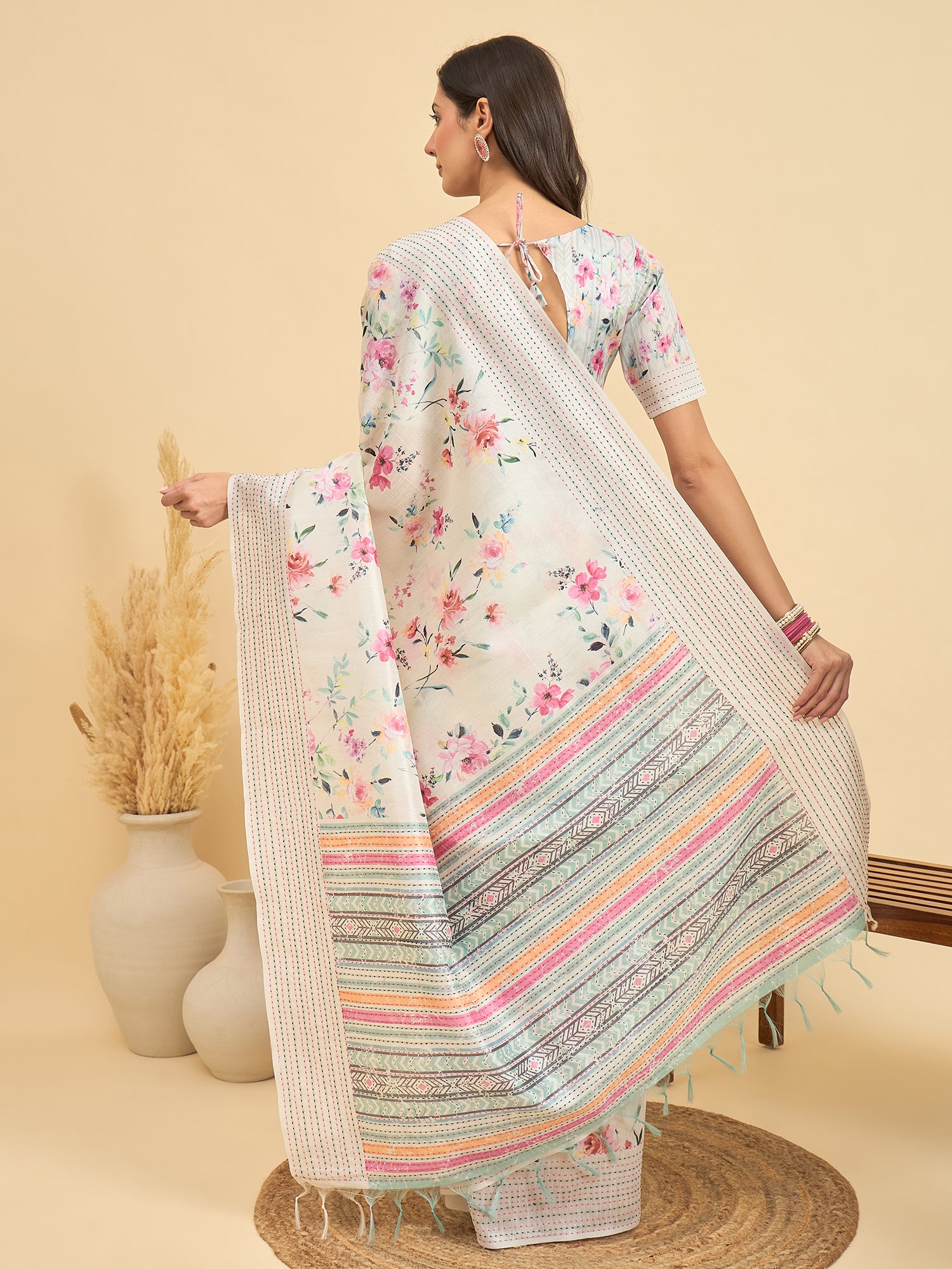 TARANG-Elegant Off-White Floral Printed Linen Saree with Multicolor Woven Border & Tassel Detailing