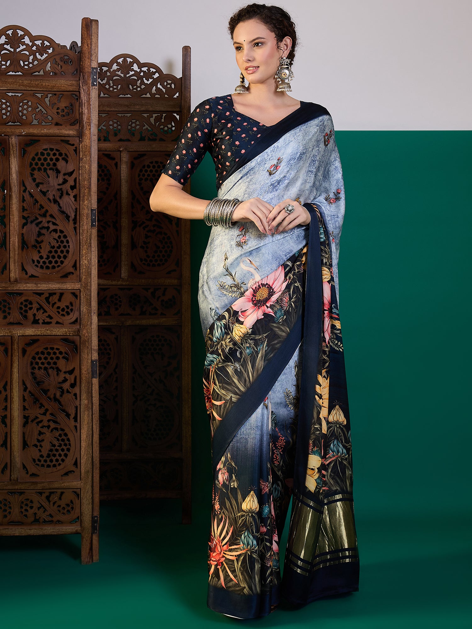 SURTAAL-Rich navy border with subtle zari detailing enhances the saree’s sophisticated appeal