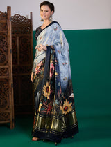 SURTAAL-Rich navy border with subtle zari detailing enhances the saree’s sophisticated appeal