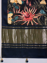 SURTAAL-Rich navy border with subtle zari detailing enhances the saree’s sophisticated appeal