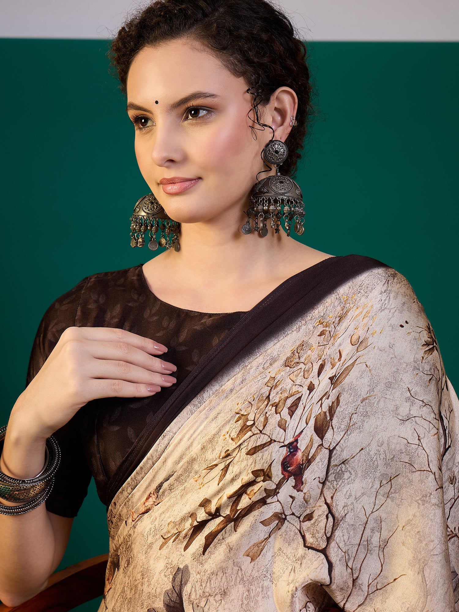 SURTAAL-Elegant beige saree adorned with artistic floral and nature-inspired digital prints