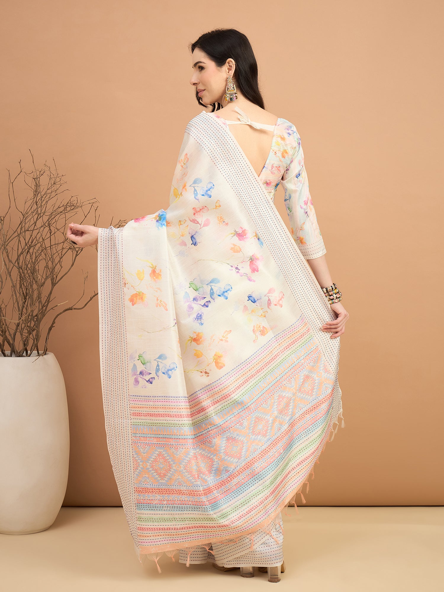 TARANG-Elegant Off-White Floral Printed Linen Saree with Pastel Woven Border & Tassel Detailing