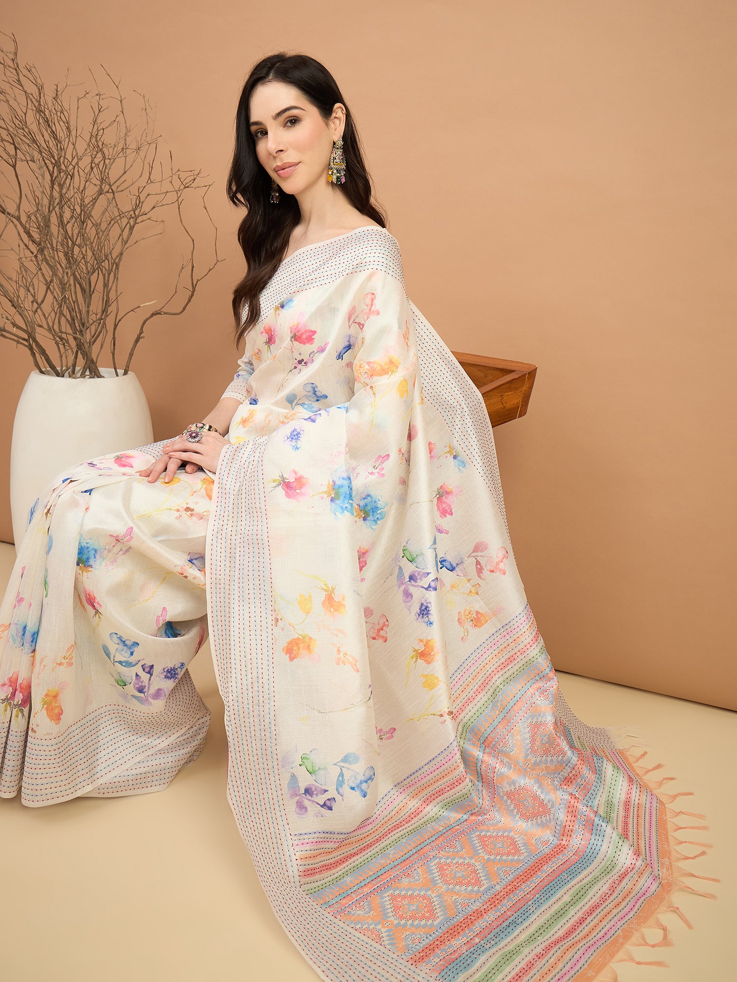TARANG-Elegant Off-White Floral Printed Linen Saree with Pastel Woven Border & Tassel Detailing