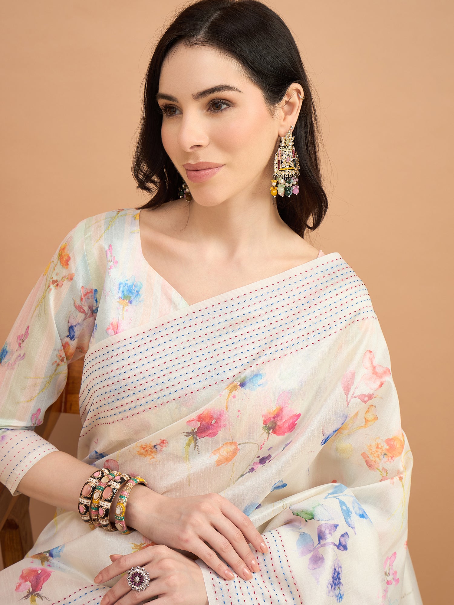 TARANG-Elegant Off-White Floral Printed Linen Saree with Pastel Woven Border & Tassel Detailing