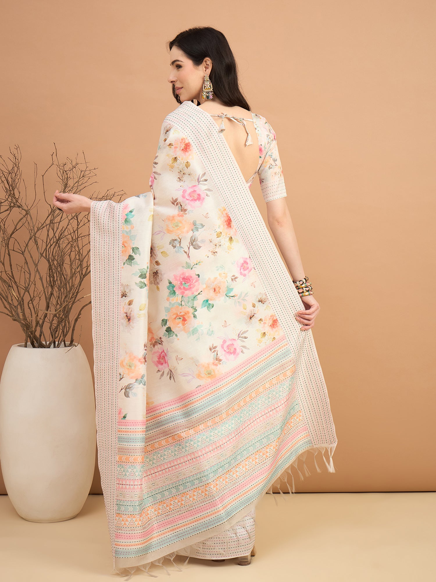 TARANG-Elegant Off-White Floral Printed Linen Saree with Pastel Geometric Border & Tassel Detailing