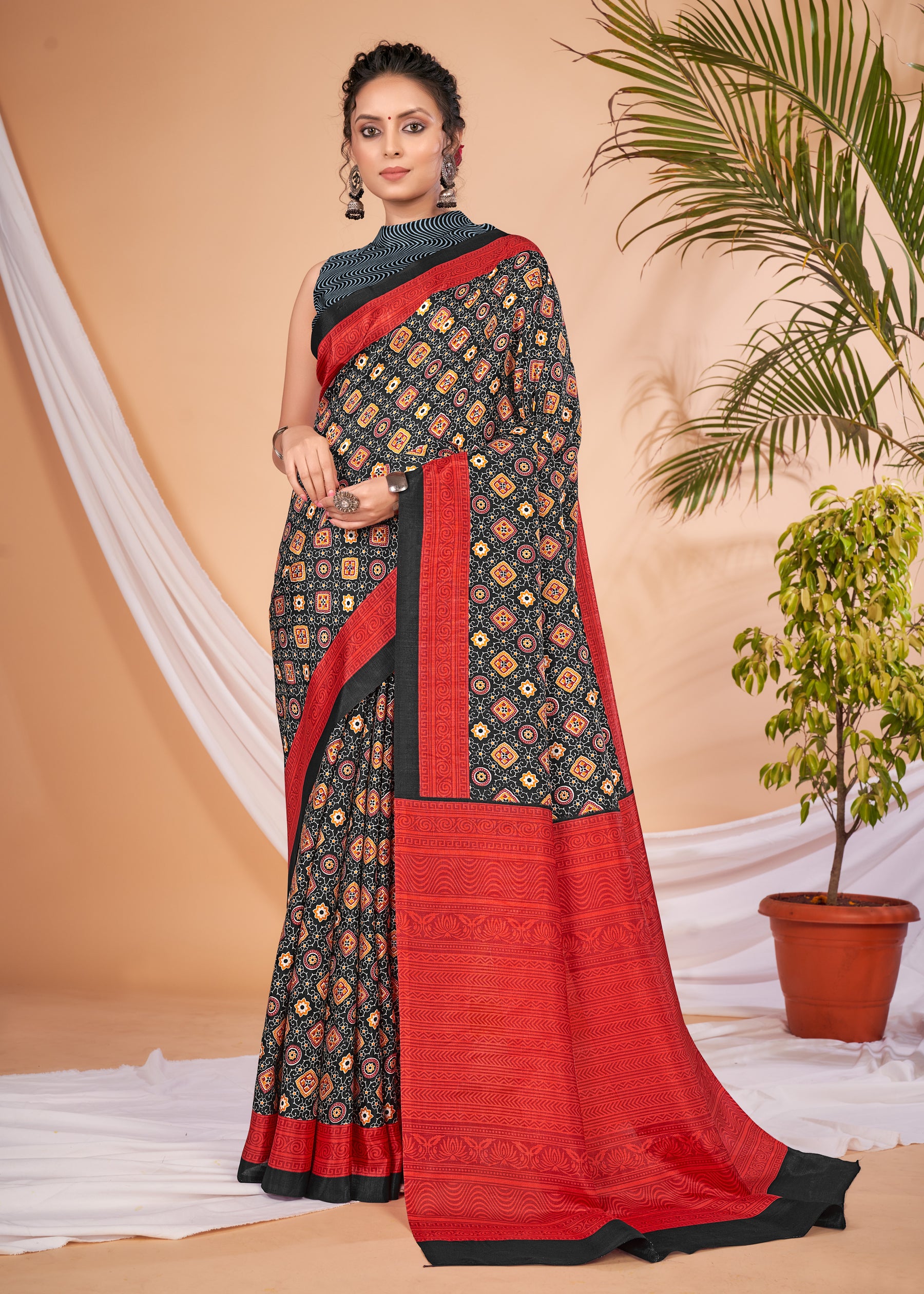 KUMRAN Midnight Black & Crimson Ajrakh Elegance Saree