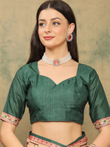 ROOPRANI-Elegant Emerald Green Traditional Printed Saree with Artistic Ethnic Border Design