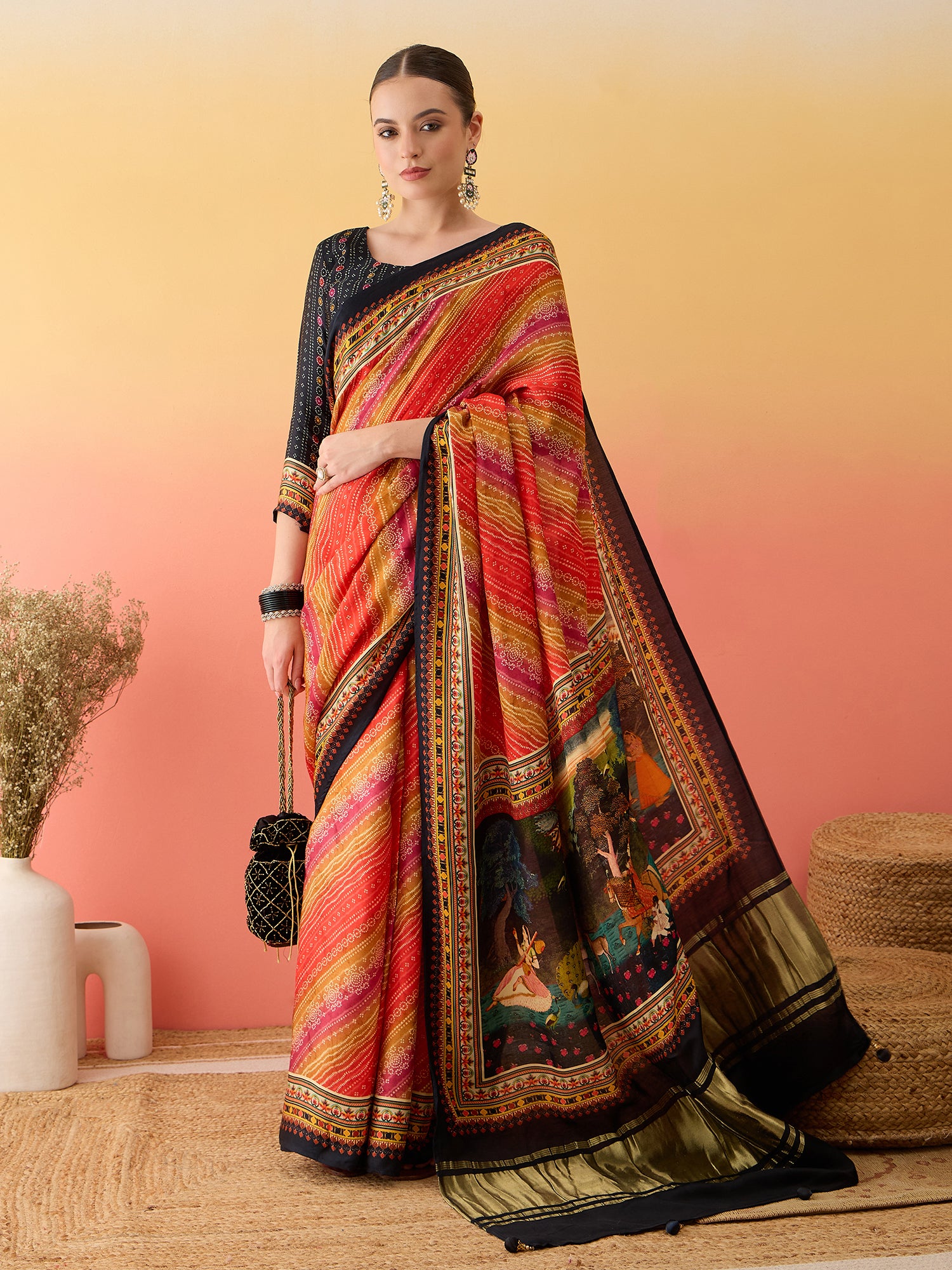 SURTAAL-Sunset Leheriya Printed Saree with Artistic Scenic Pallu & Black Border