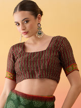 SURTAAL-Elegant dark green saree with intricate floral and nature-inspired prints