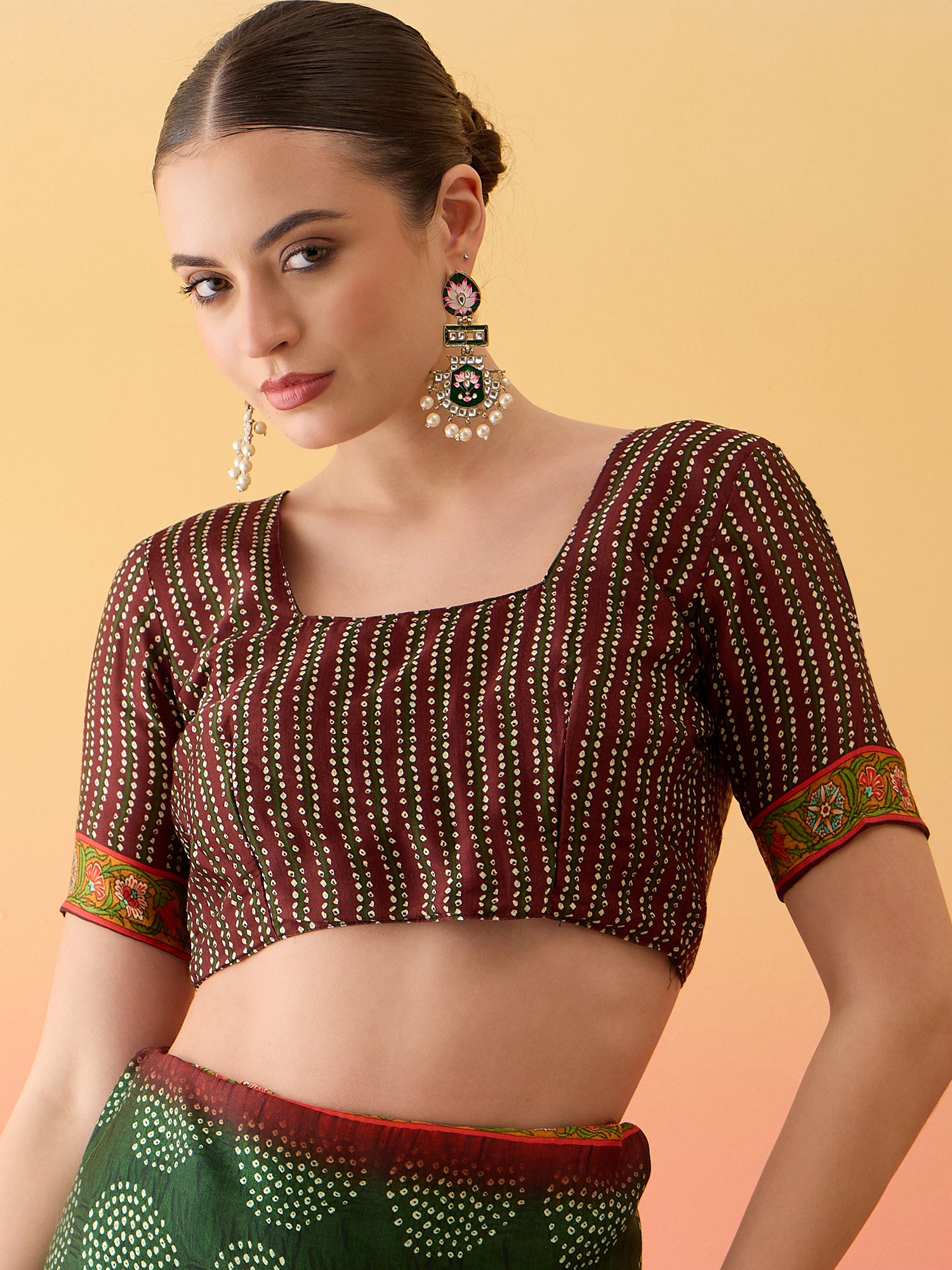 SURTAAL-Elegant dark green saree with intricate floral and nature-inspired prints