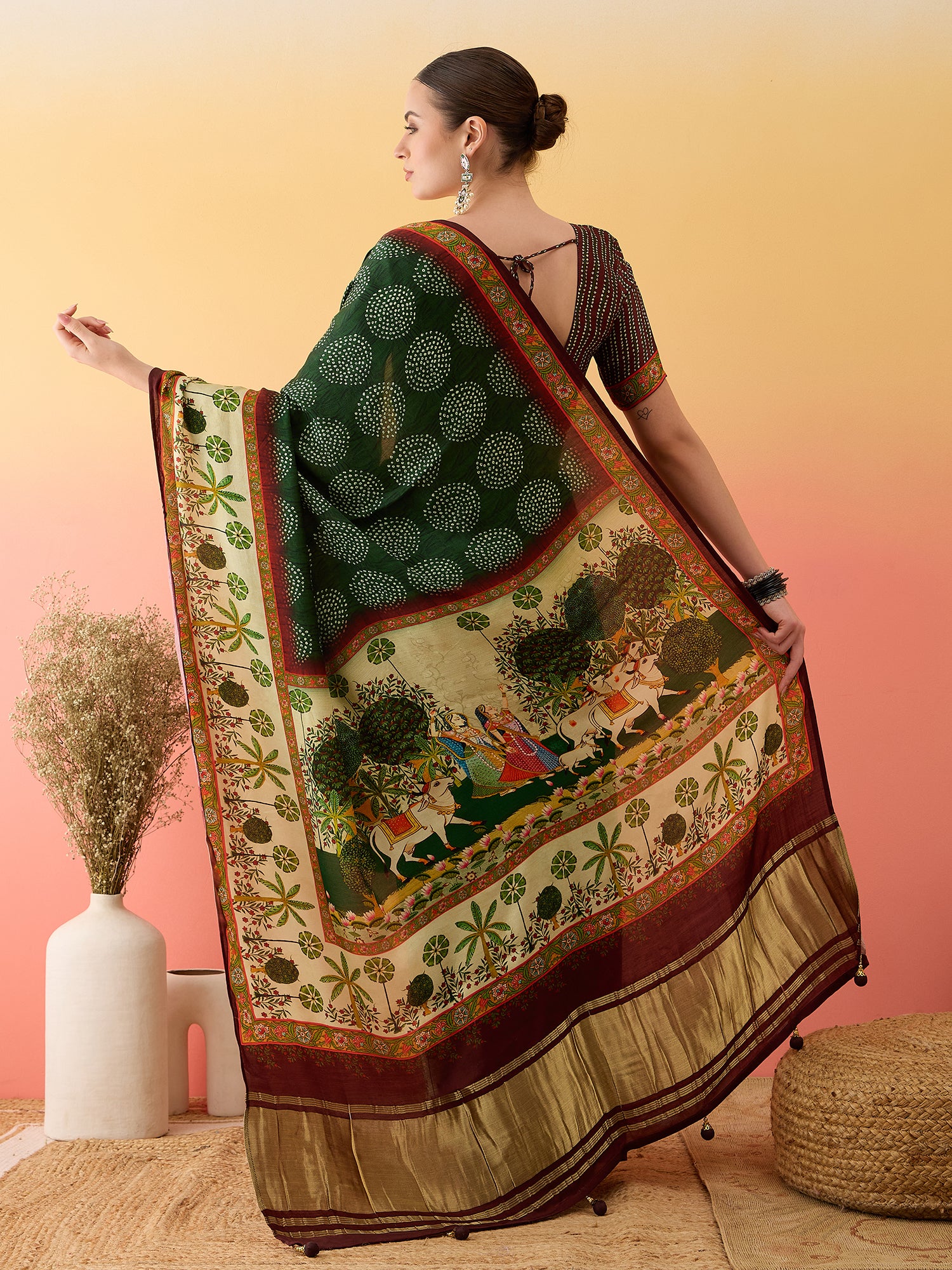 SURTAAL-Elegant dark green saree with intricate floral and nature-inspired prints
