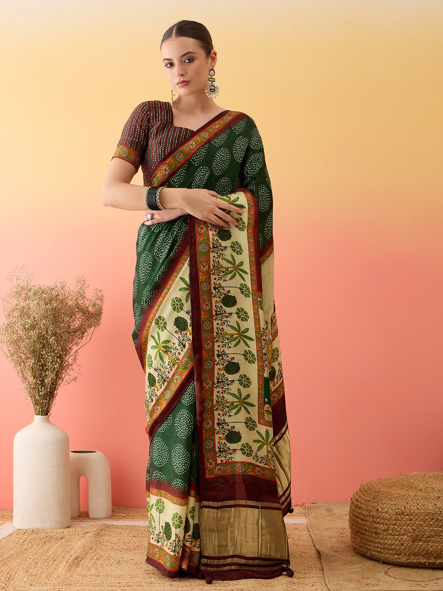 SURTAAL-Elegant dark green saree with intricate floral and nature-inspired prints