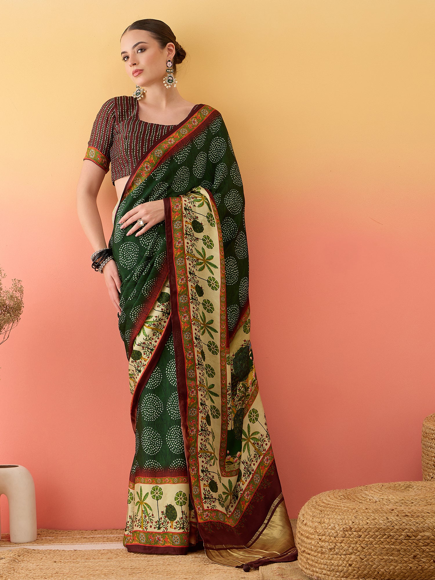 SURTAAL-Elegant dark green saree with intricate floral and nature-inspired prints