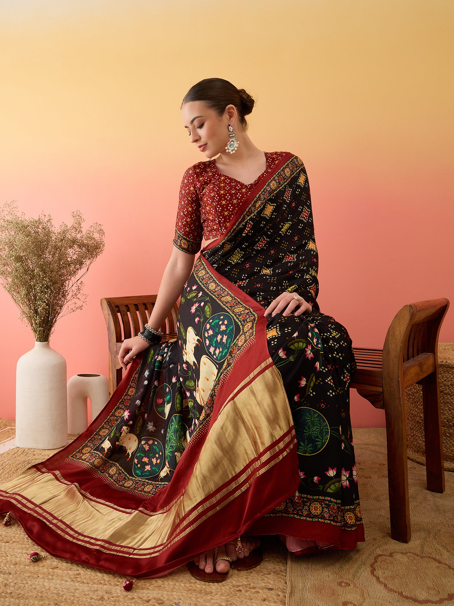 SURTAAL-Elegant Black Printed Saree with Floral Heritage Border & Maroon Pallu