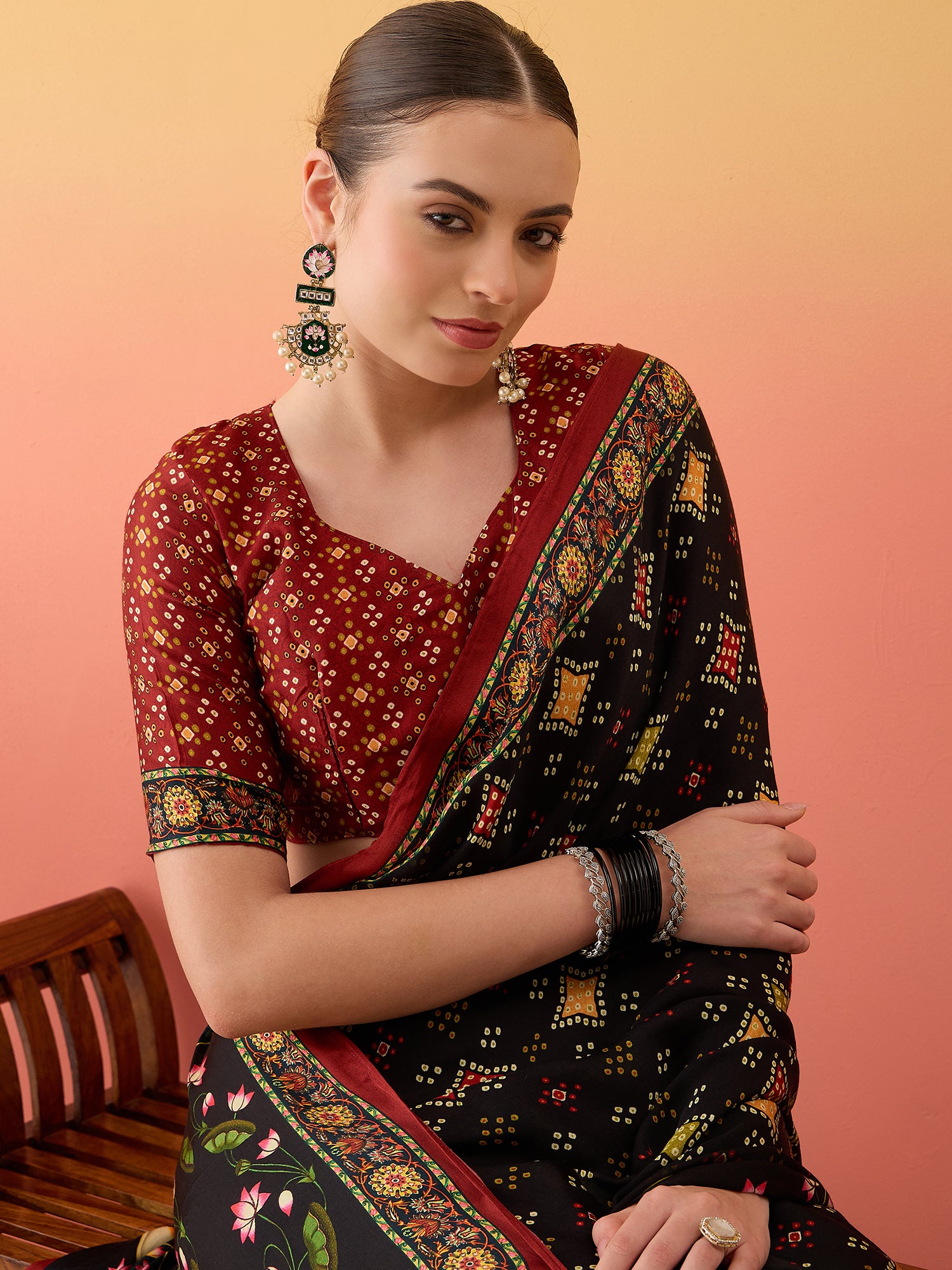 SURTAAL-Elegant Black Printed Saree with Floral Heritage Border & Maroon Pallu
