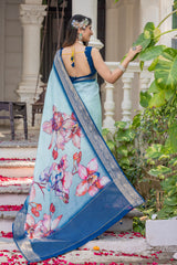 ADHIRA-Elegant Sky Blue Floral Printed Saree with Rich Silver Zari Border and Luxurious Silk Designer Traditional Drape