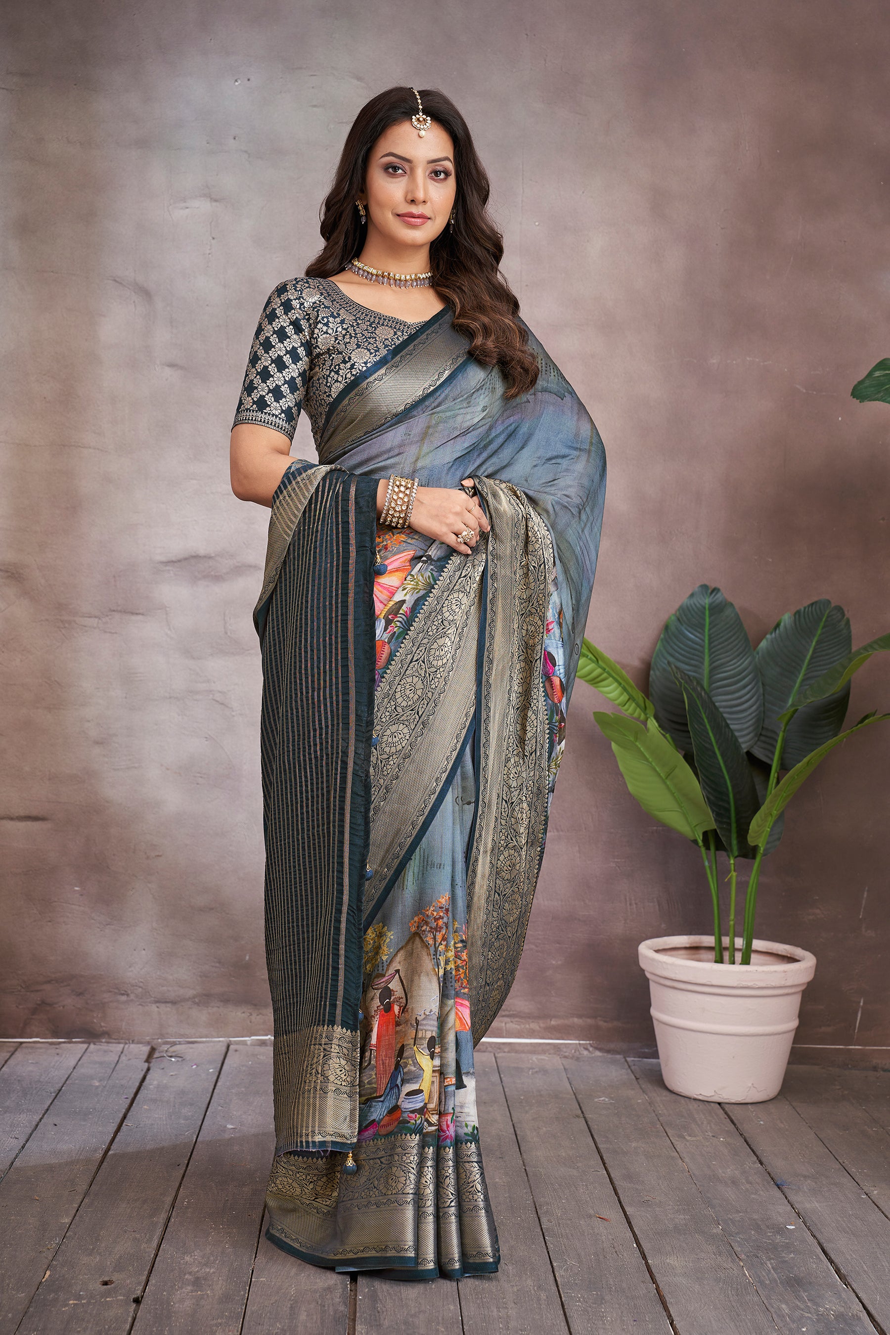 ADHIRA-Elegant Steel Blue Scenic Printed Saree with Antique Gold Zari Border and Designer Black Woven Blouse for Festive & Ethnic Wear