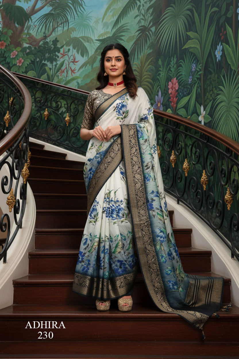 ADHIRA-Elegant White Floral Printed Silk Saree with Rich Black & Gold Zari Border – Designer Festive Wear Ethnic Saree for Women with Blue Botanical Motifs and Traditional Woven Pallu