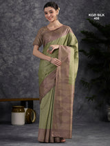 KOZI SILK-Elegant Pistachio Green Kozi Silk Saree with Mauve Geometric Zari Border & Rich Woven Pallu