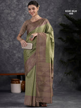 KOZI SILK-Elegant Pistachio Green Kozi Silk Saree with Mauve Geometric Zari Border & Rich Woven Pallu