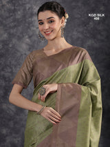 KOZI SILK-Elegant Pistachio Green Kozi Silk Saree with Mauve Geometric Zari Border & Rich Woven Pallu