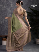 KOZI SILK-Elegant Pistachio Green Kozi Silk Saree with Mauve Geometric Zari Border & Rich Woven Pallu